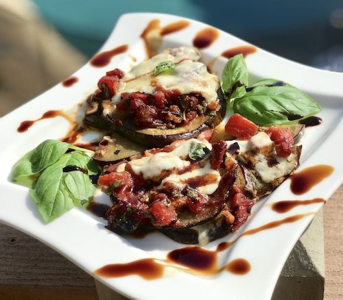 Eggplant Baked with Tomatoes, Basil and Mozzarella Cheese